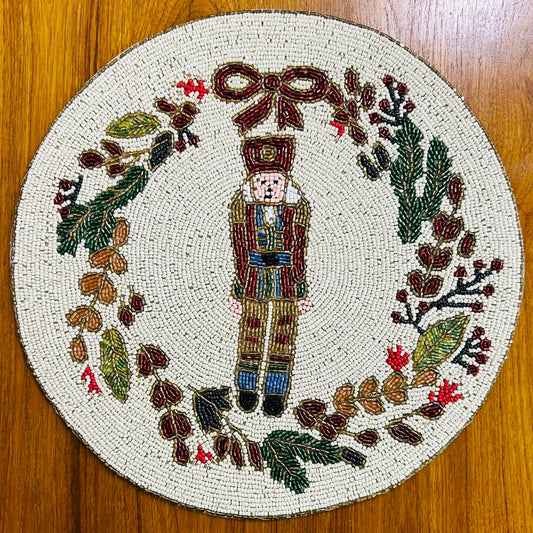 Handmade Beaded Placemat / Tablemat - 14" round | Nutcracker with Floral circular Wreath | Red, Green, Gold and White colour
